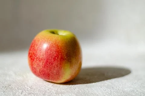 Red apple closeup on the table Stock Photos
