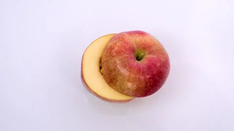 Red apple with colored pills and capsules Stock Footage 173604723