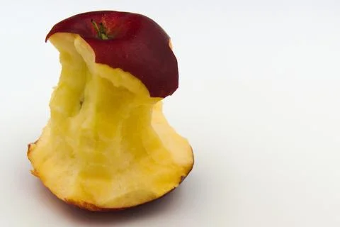 Red apple core on a white background Stockfoto's