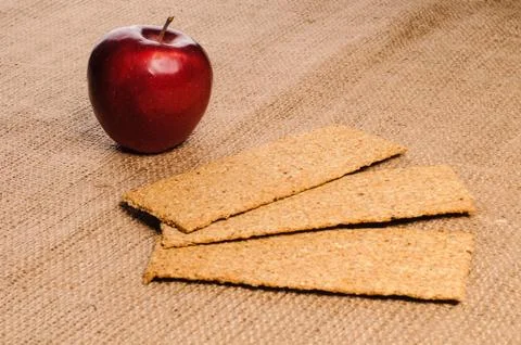 Red apple with crispbread Stock Photos