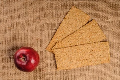 Red apple with crispbread Stock Photos