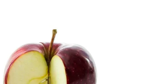 Red apple cut in quarter Stock Photos