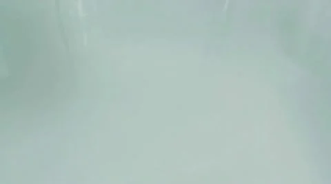 Red apple falling into water Stock Footage 10871023