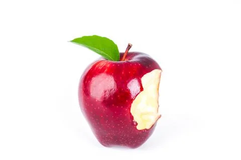 Red apple with green leaf and missing a bite . Stock Photos