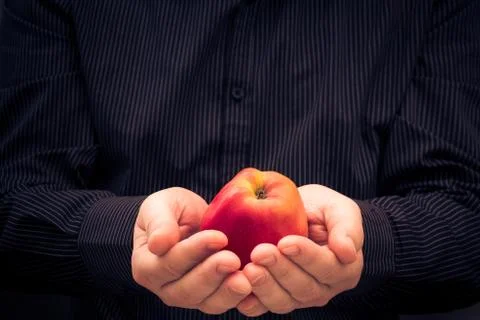 Red apple hands man Stock Photos