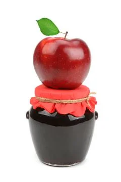 Red apple on jar of jam Stock Photos