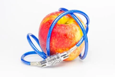 Red apple with a key code Stock Photos