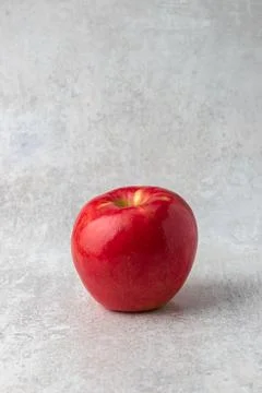Red apple on a light background Stock Photos