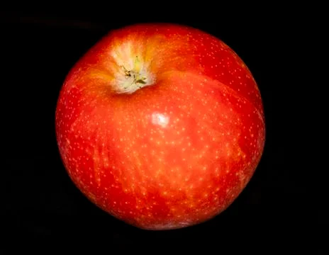 Red apple on in a low key Stockfoto's