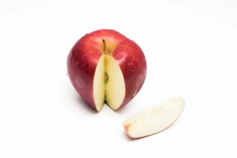 Red apple with slice isolated on white background Fotos de archivo