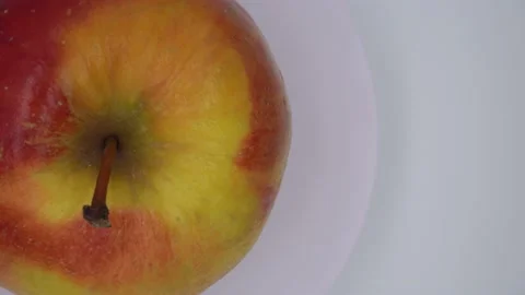 Red apple on a spinning stand Stock Footage 141787451
