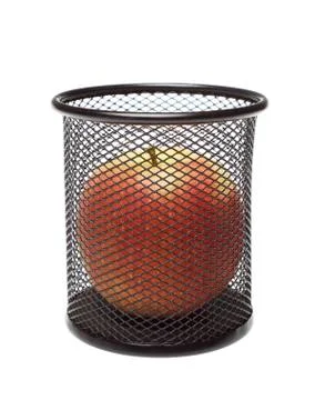 Red apple into trash Stock Photos