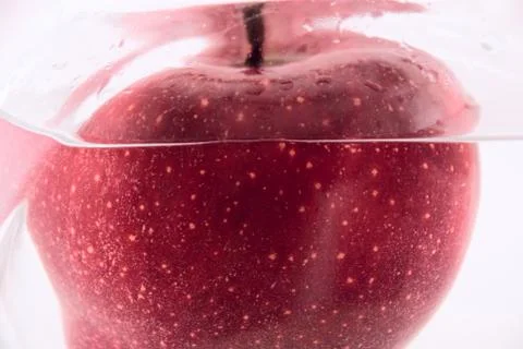 Red apple in the water Stock Photos