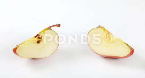Red apple wedges Stock Photos