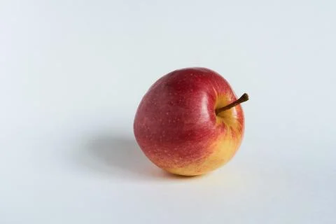 Red apple on a white background. Close up. Isolated. Stock Photos