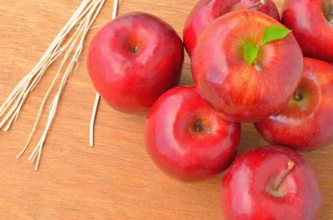 Red apple on wood background Stock Photos