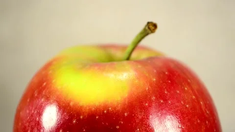 Red apple with yellow spot Video stock 143513381