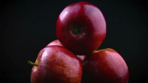 Red apples on a black background Stock Footage 150822836