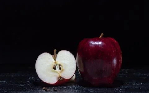 Red apples on a black background Stock Photos