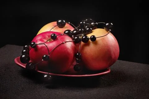 Red apples on a black background Stock Photos
