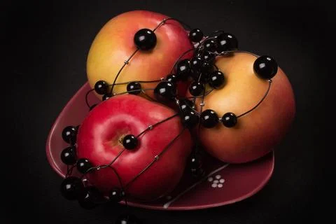 Red apples on a black background Stock Photos