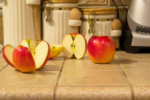 Red Apples on the counter Stock Photos