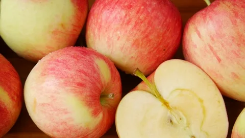 Red apples on a cutting board. Stock Footage 328652200