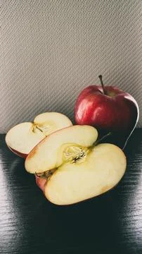 Red apples on a dark background, Red Chief variety Stock Photos