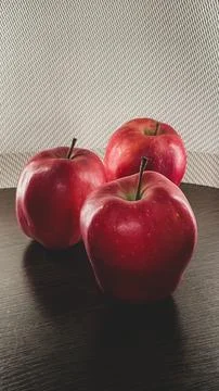 Red apples on a dark background, Red Chief variety Stock Photos
