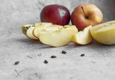 Red apples on a gray background. Fotos Stock