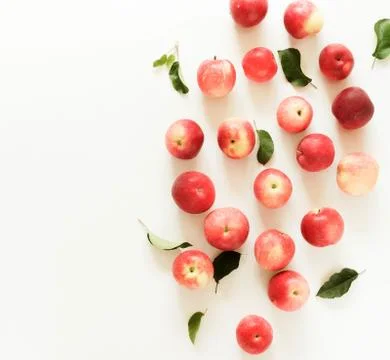 Red apples pattern on white vintage background.Top view.Copy space. flat lay Stock Photos