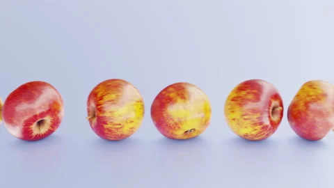 Red apples roll in a loop on a light background Stock Footage 213632667