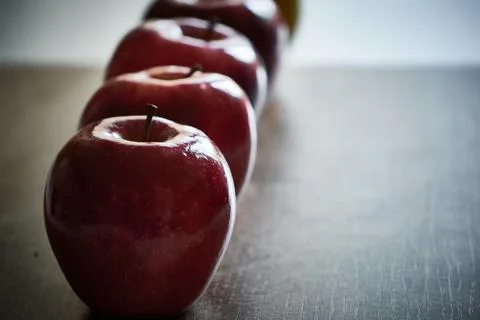 Red apples in a row Stock Photos