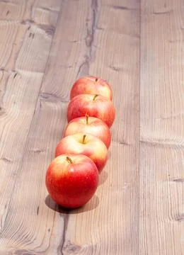 Red apples in a row Stock Photos