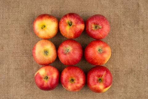 Red apples on sackcloth. 스톡 사진