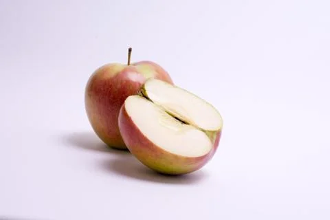 Red apples with slice isolated on the white background Stock Photos