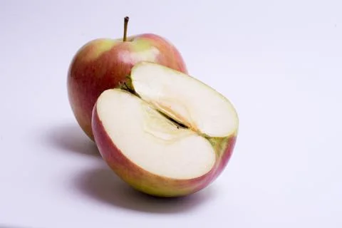 Red apples with slice isolated on the white background Stock Photos