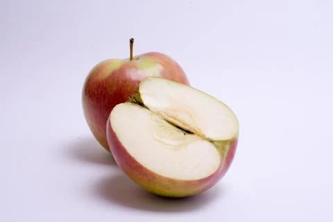Red apples with slice isolated on the white background Stock Photos