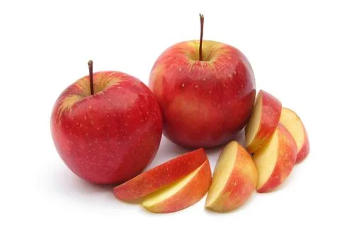 Red apples with some slice on white background Fotos Stock