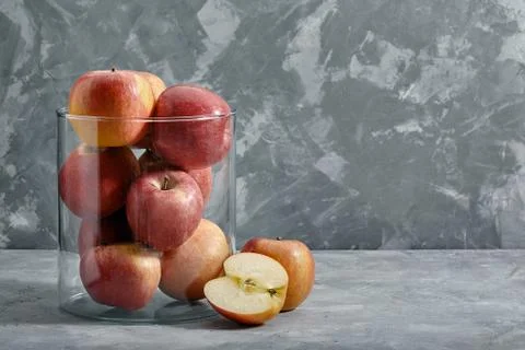 Red apples on the table. Top view with copy space on gray stone background. 写真素材