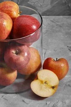 Red apples on the table. Top view with copy space on gray stone background. Stock Photos