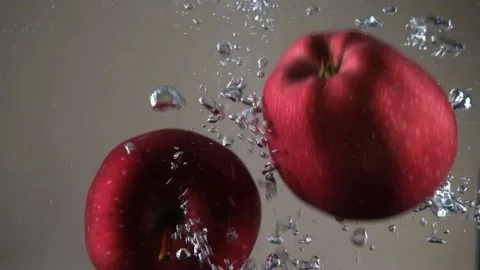 Red apples in water Video stock 197018683
