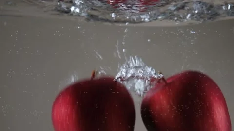 Red apples in water Stock Footage 197524912