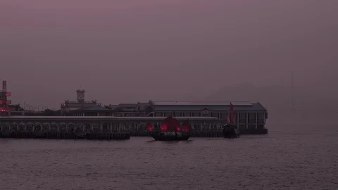 Red Aqua Luna Boat docking at Hong Kong Central Star Ferry Pier Stock Footage 130430716