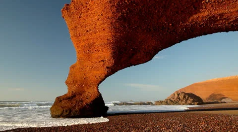 Red archs on atlantic ocean coast. Morocco Stock-Footage 24644473