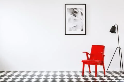 Red armchair in empty interior Stock Photos