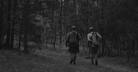 Red Army soldiers walking through the woods in World War II Stock Footage 336339860