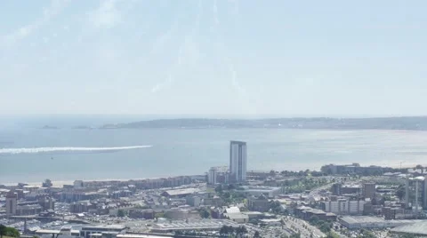 Red Arrow Planes flying over swansea city Stock Footage 65062444