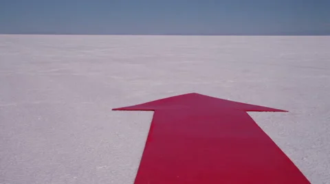 Red arrow at salt flat, dolly movement Video stock 62281883