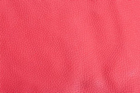 Red artificial leather texture for background closeup Stock Photos